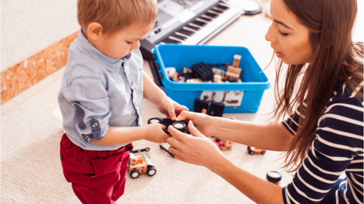 parent helping child image